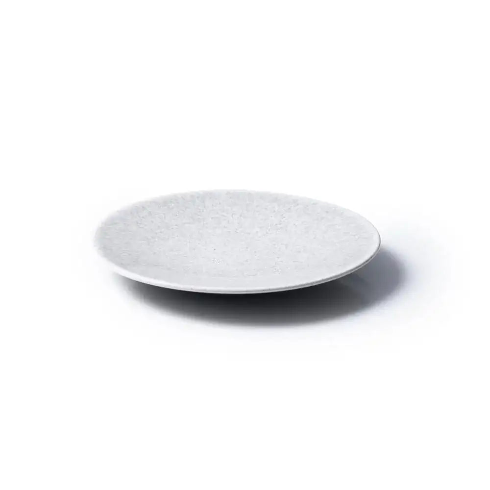 White ceramic plate on a white background