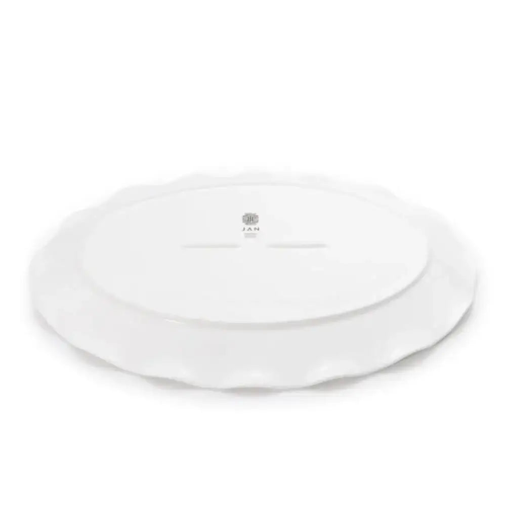 White ceramic plate with a brand logo on a white background