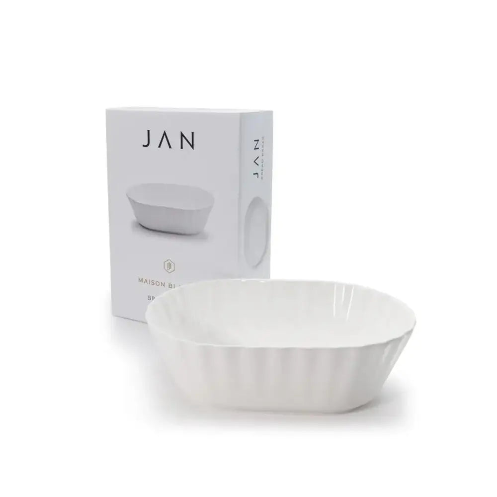 White bowl with packaging displaying 'JAN' on a white background