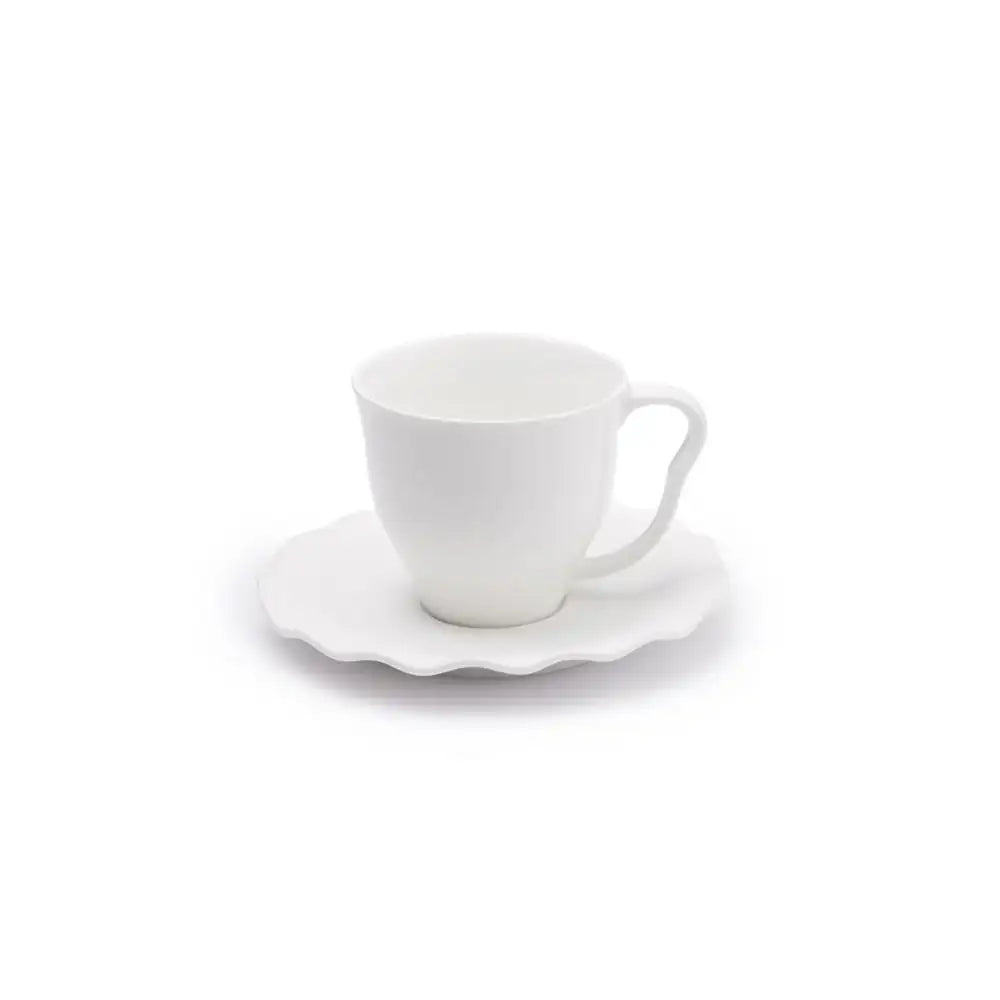 White ceramic cup and saucer on a white background