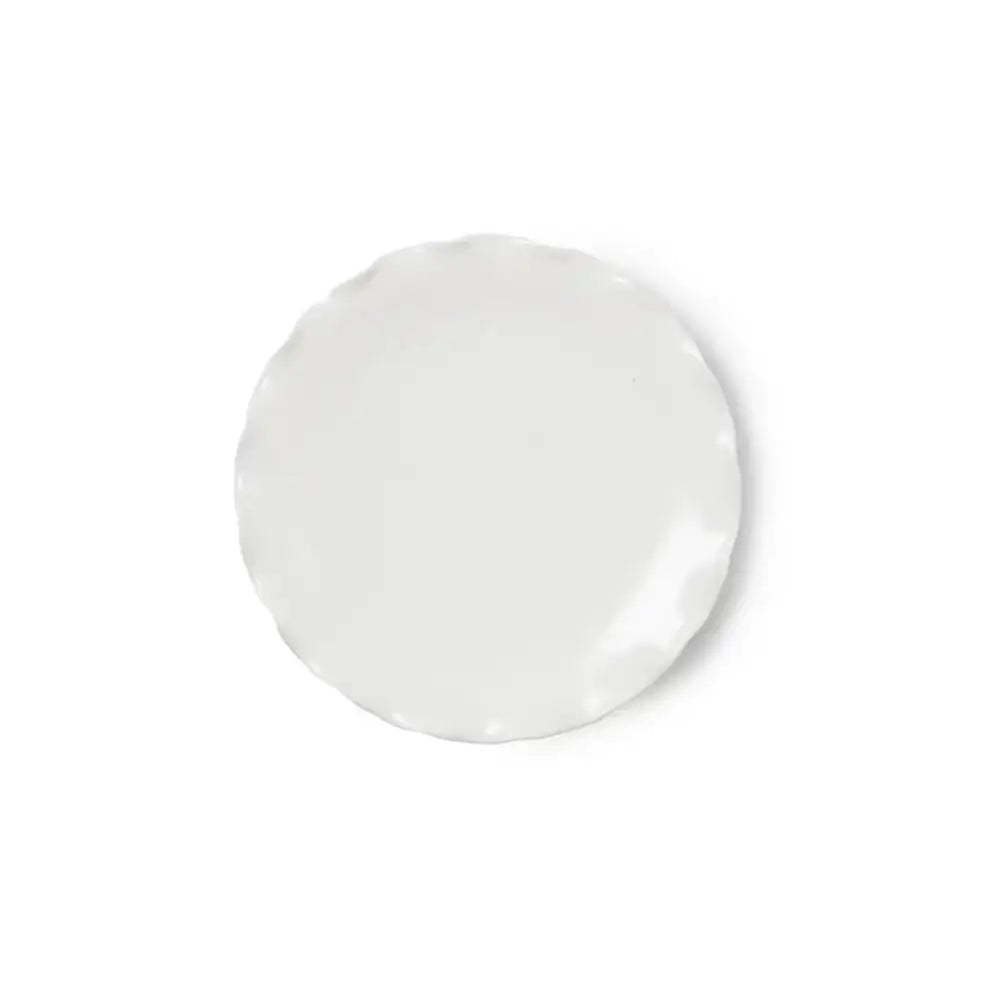 White ceramic plate on a white background