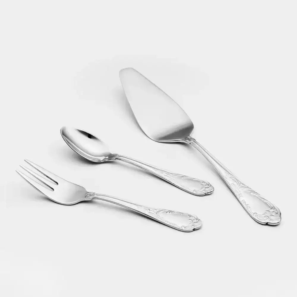 Set of silver cutlery including a fork, spoon, and cake server on a white background