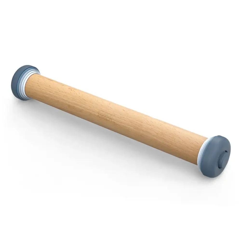 Wooden rolling pin with blue ends on a white background