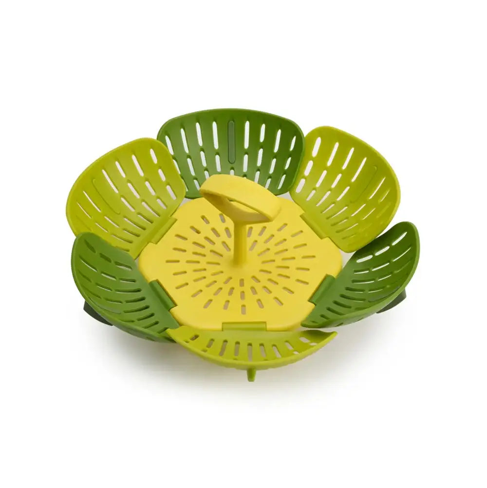 Green and yellow kitchen strainer on a white background