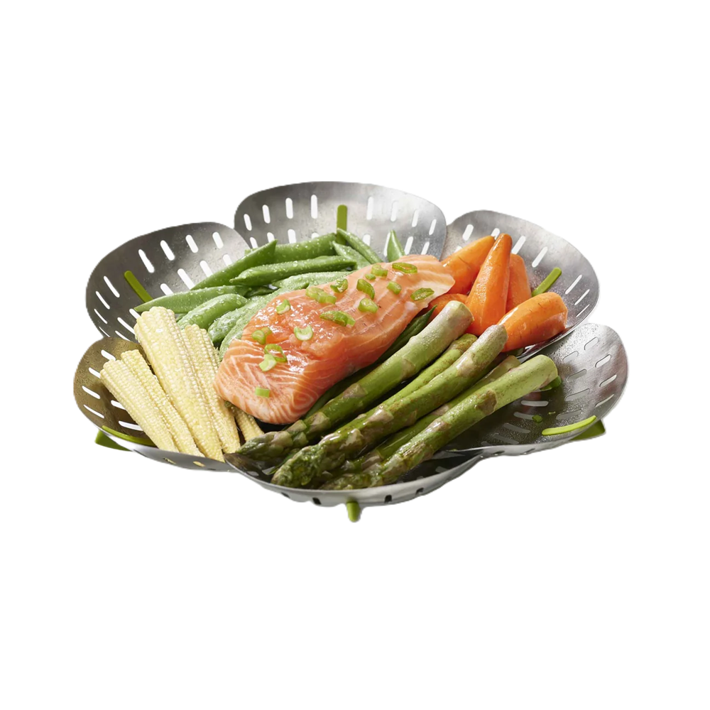 Stainless steel steamer basket with fish a vegetables