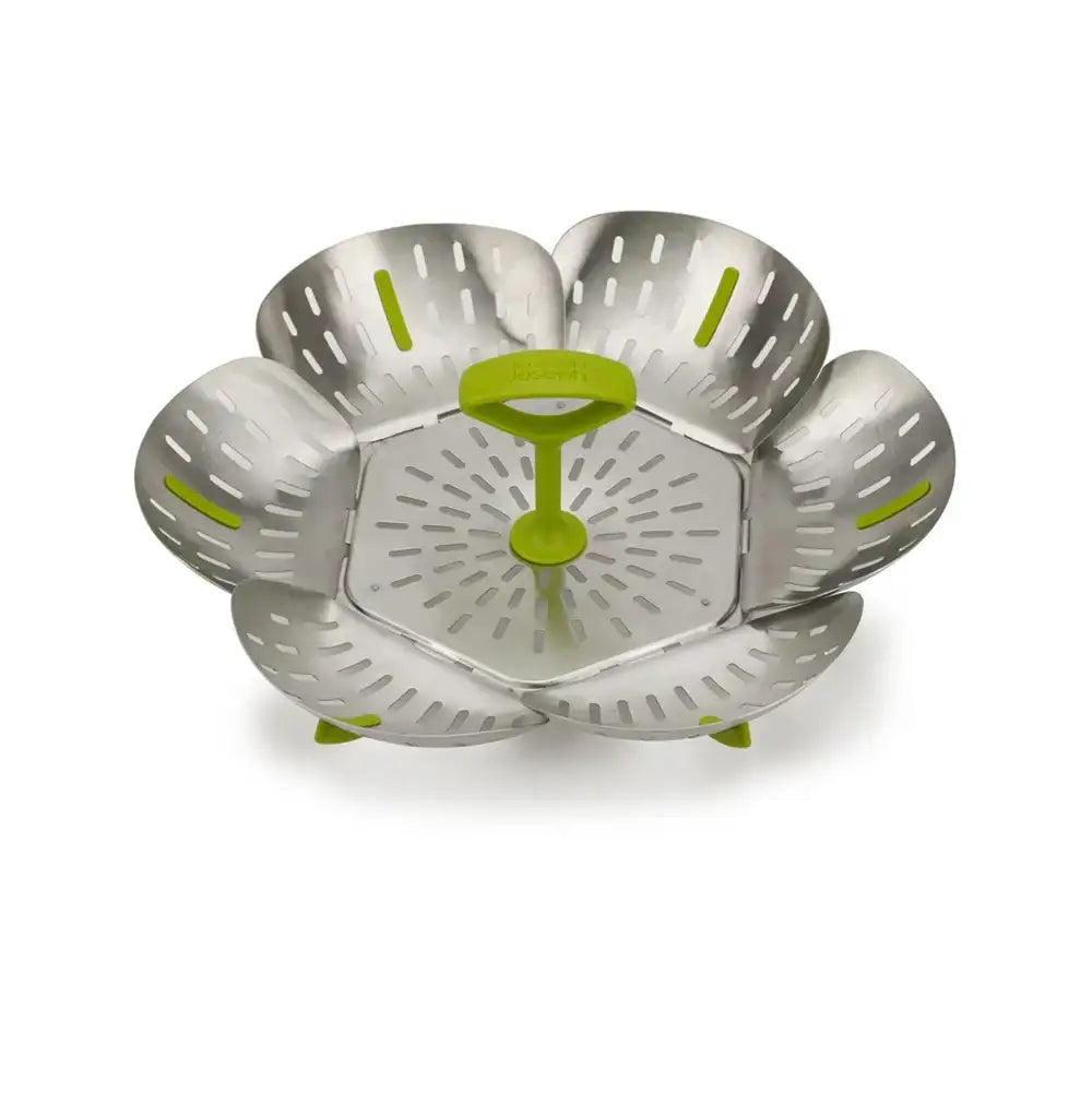 Metal steamer basket with green accents on a white background