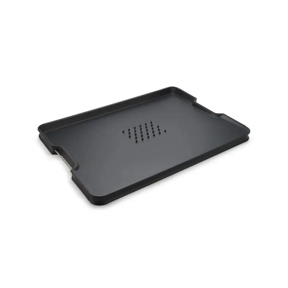 Black tray with textured surface on a white background