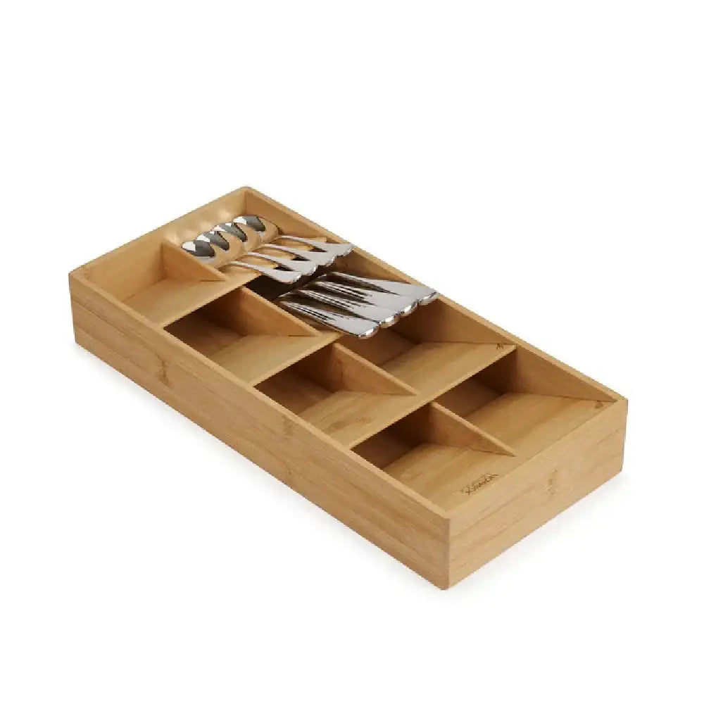 Large bamboo cutlery organiser tray with compartments holding silverware on white background