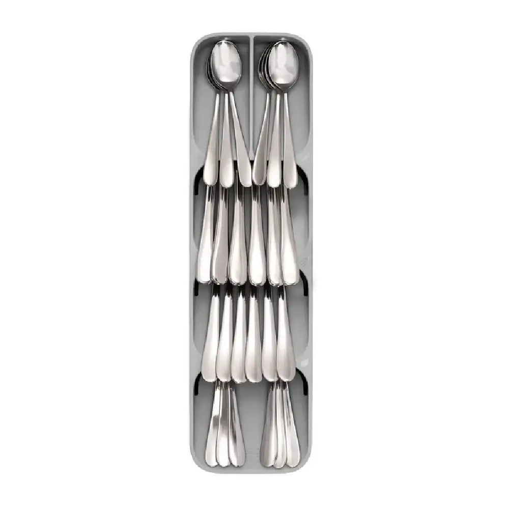 Grey compact cutlery organizer holding neatly stacked silverware on white background
