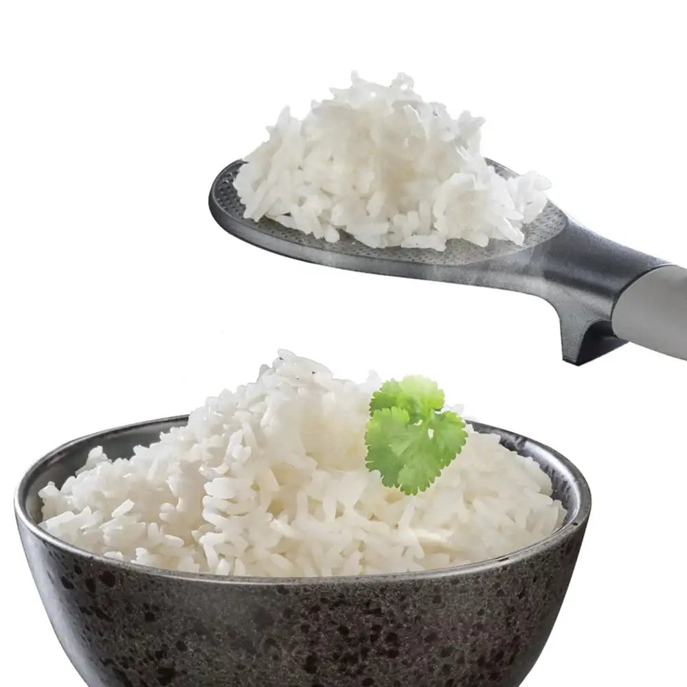 Bowl of white rice with a serving spoon on a white background