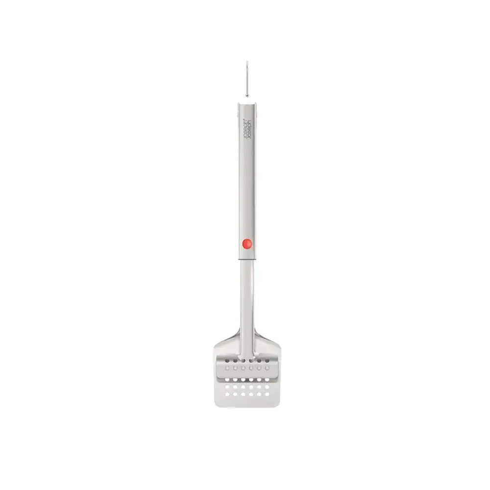 Metal spatula with a red button on a white background