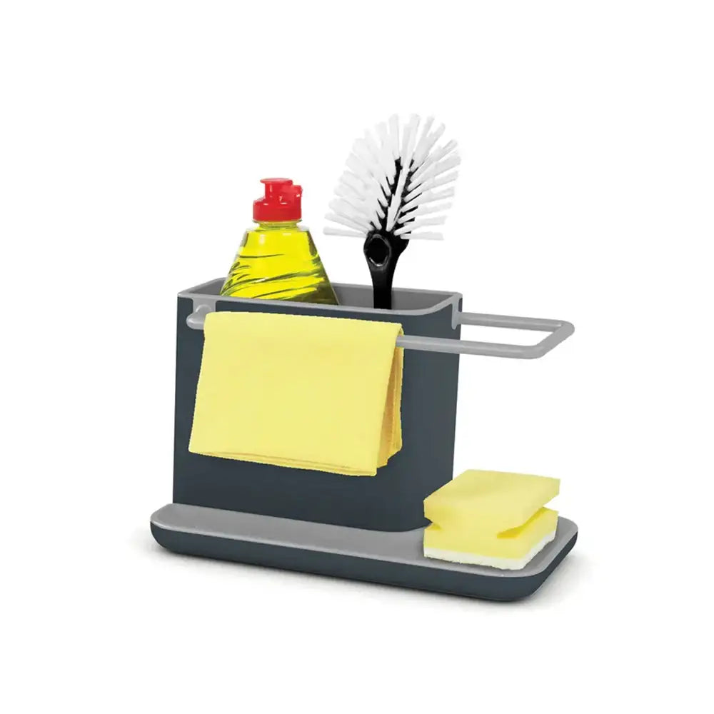 Dishwashing station with sponge, brush, and soap bottle on a white background