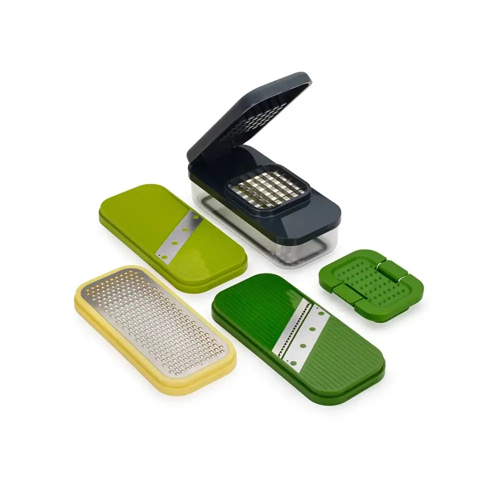 Set of green and yellow kitchen graters on a white background