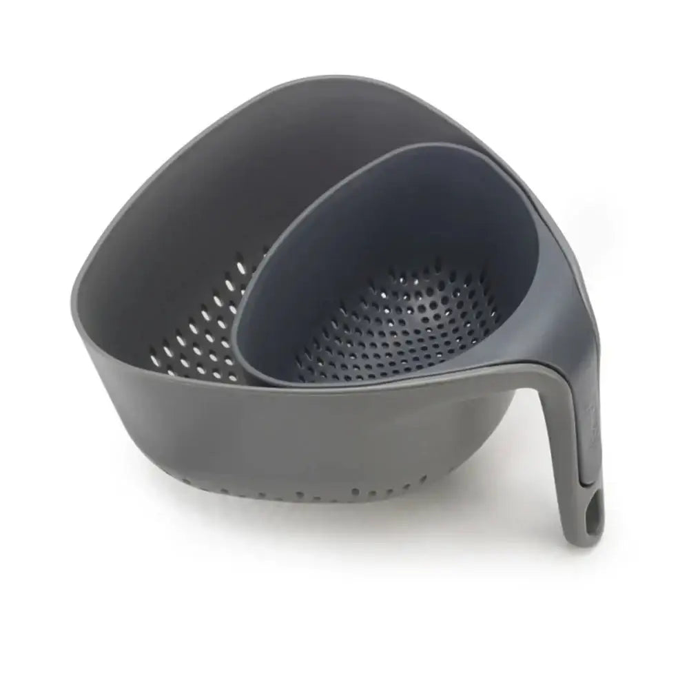 Gray plastic colander on a white background