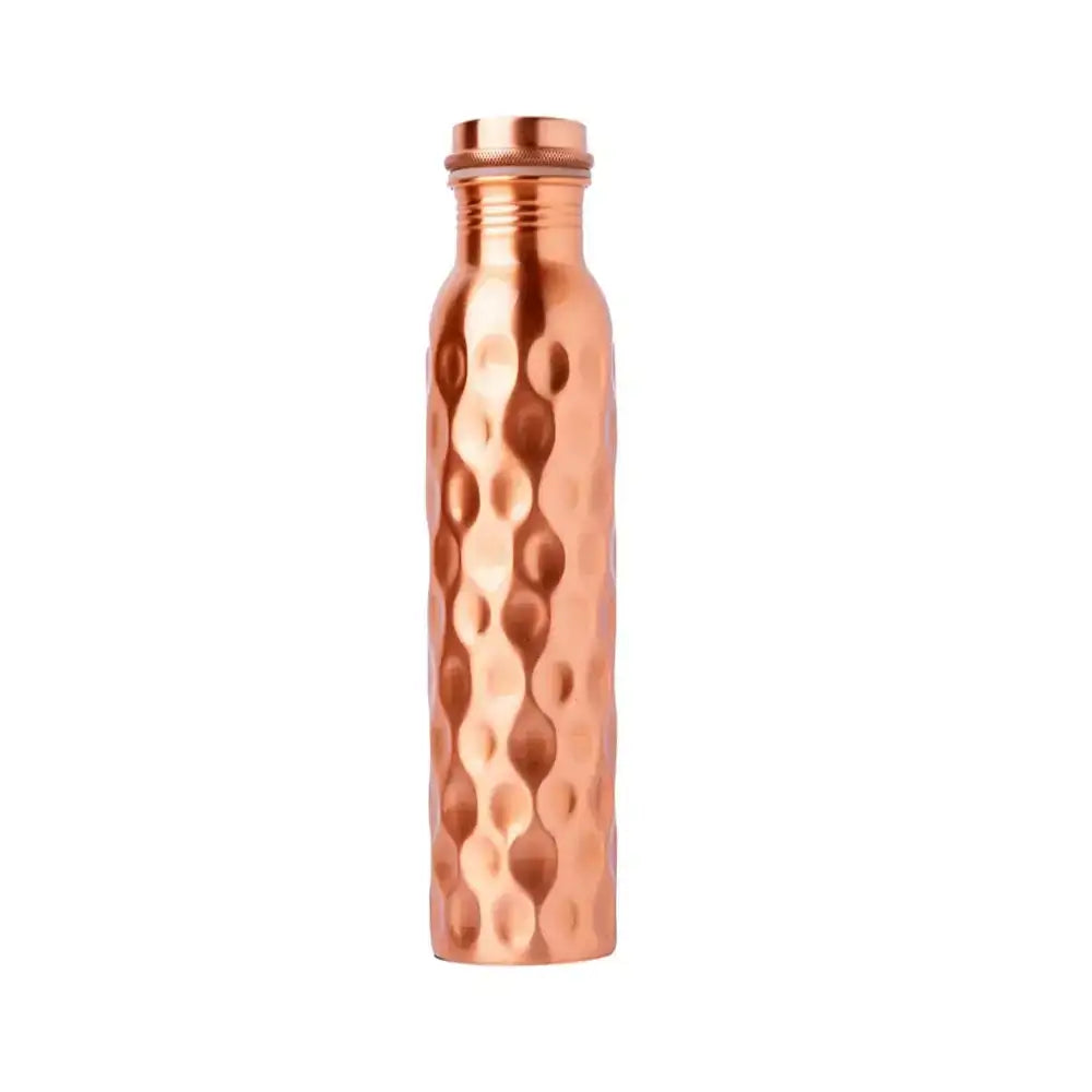 Copper water bottle with a textured surface on a white background