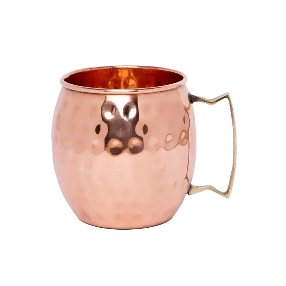 Copper mug with a handle on a white background