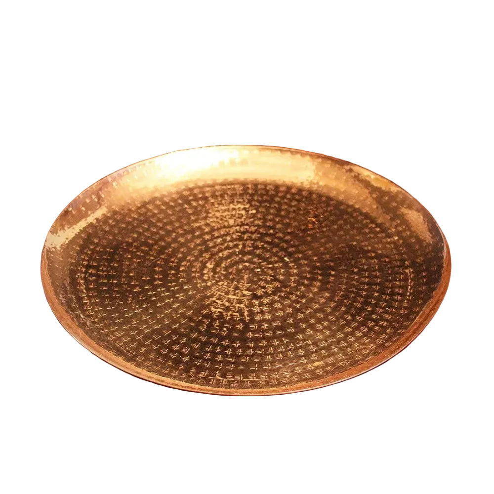 Decorative copper tray on a white background