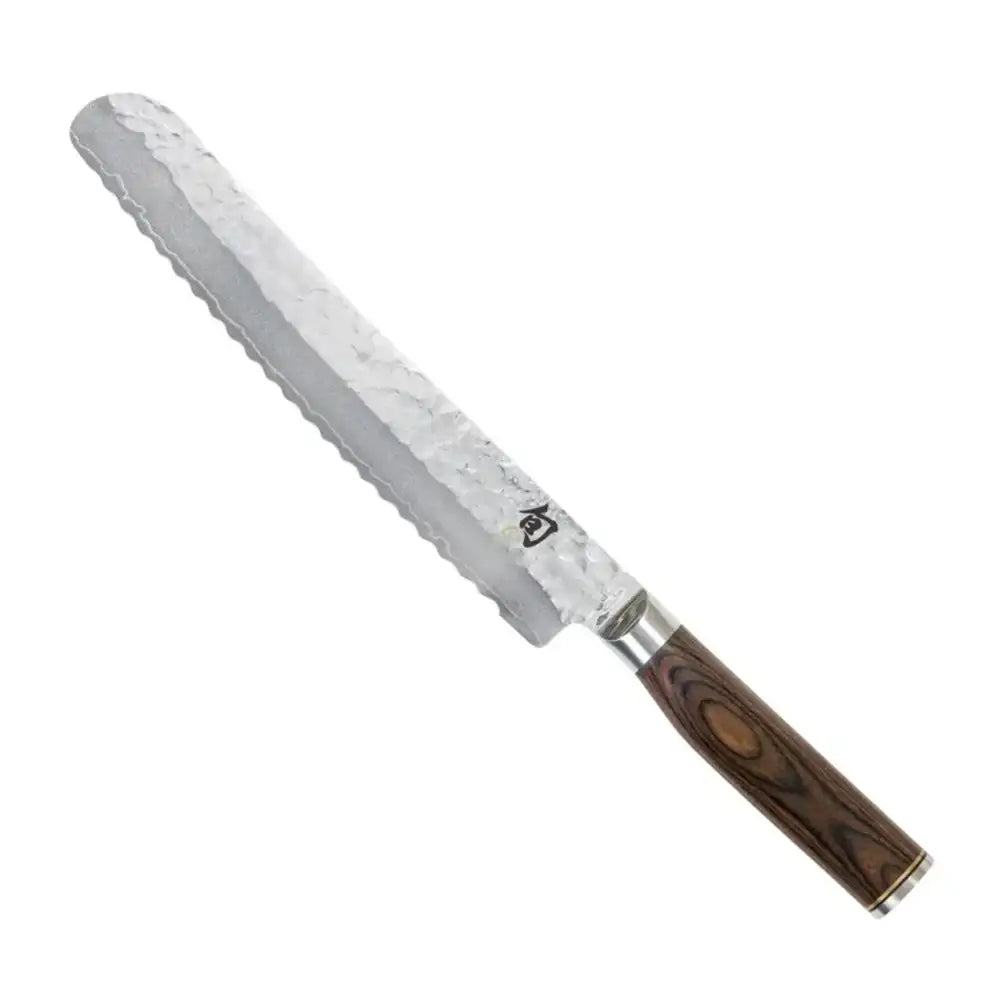 Bread knife with a wooden handle on a white background