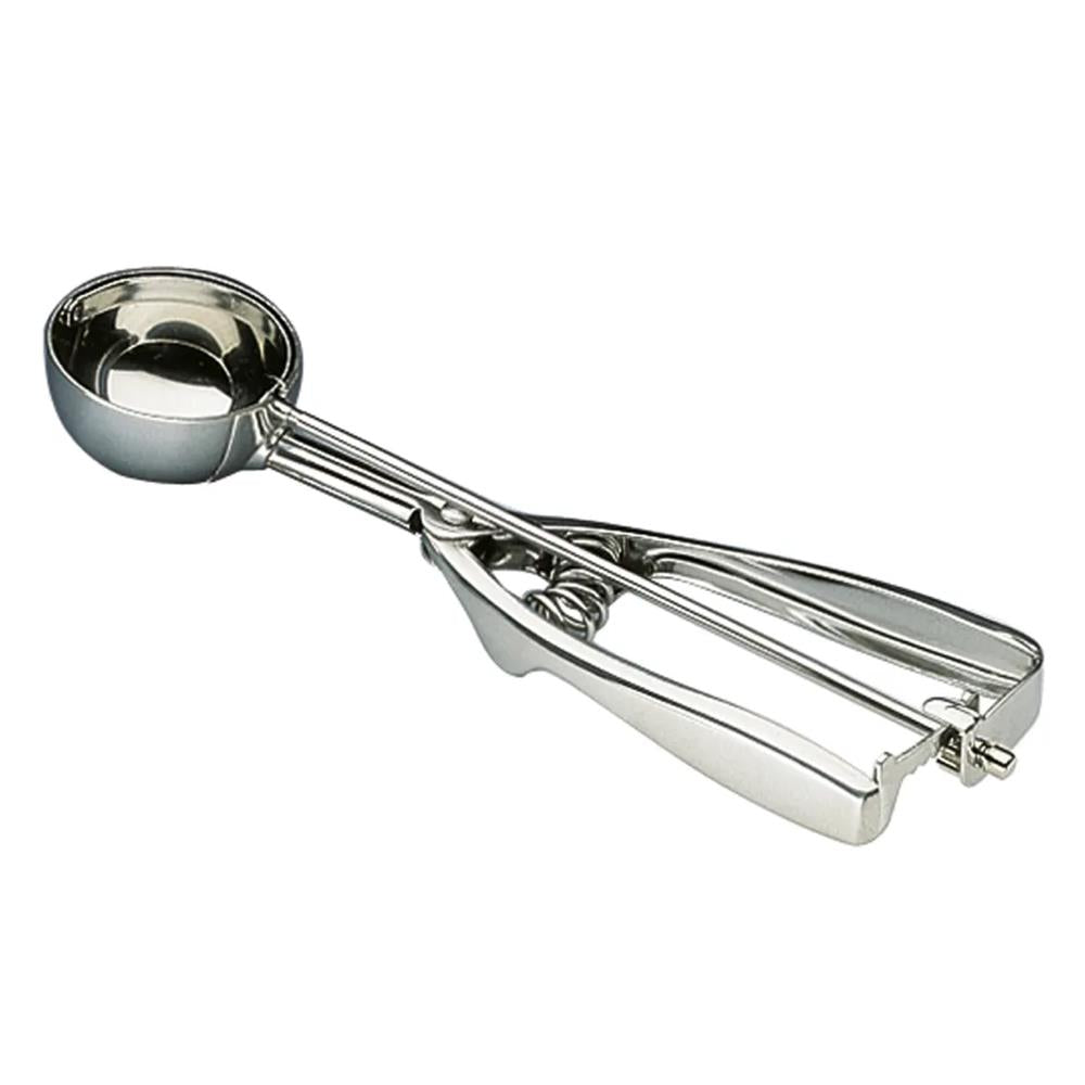 Metallic ice cream scoop on a white background