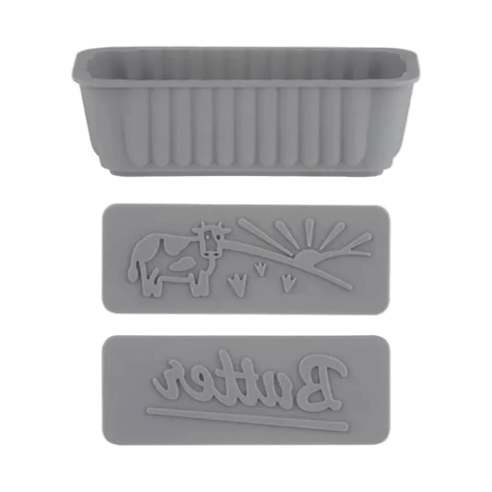 Gray silicone mold with cow design and 'Butter' branding on a white background