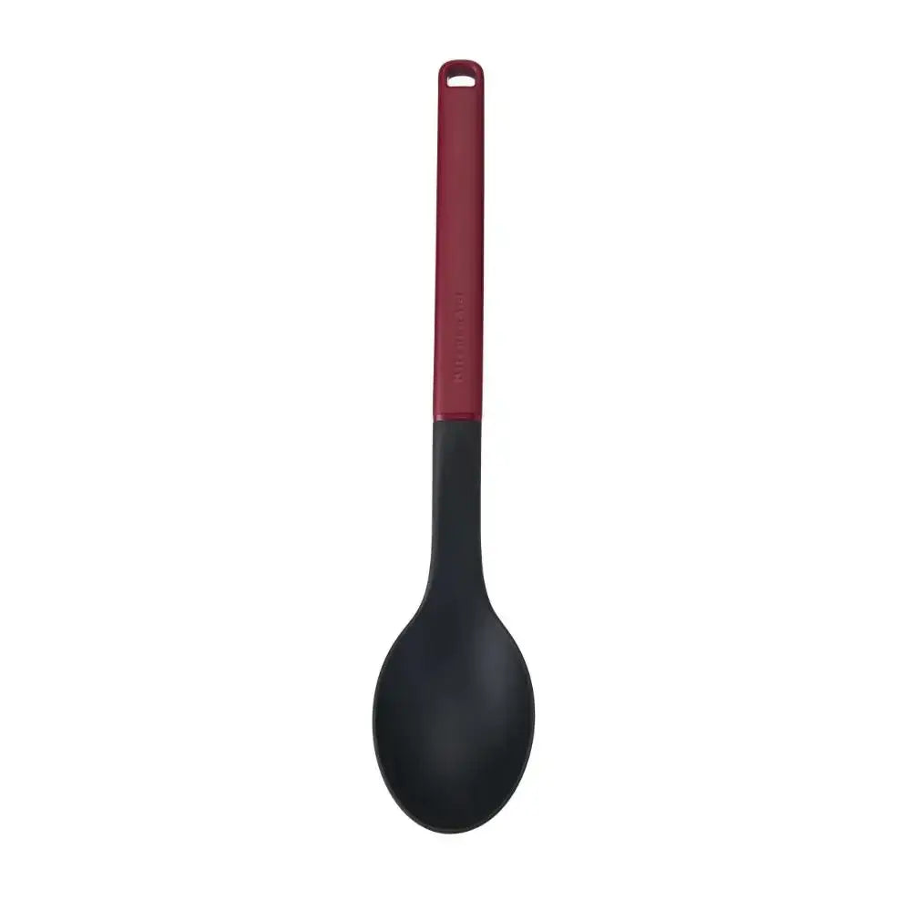 Black spoon with a red handle on a white background