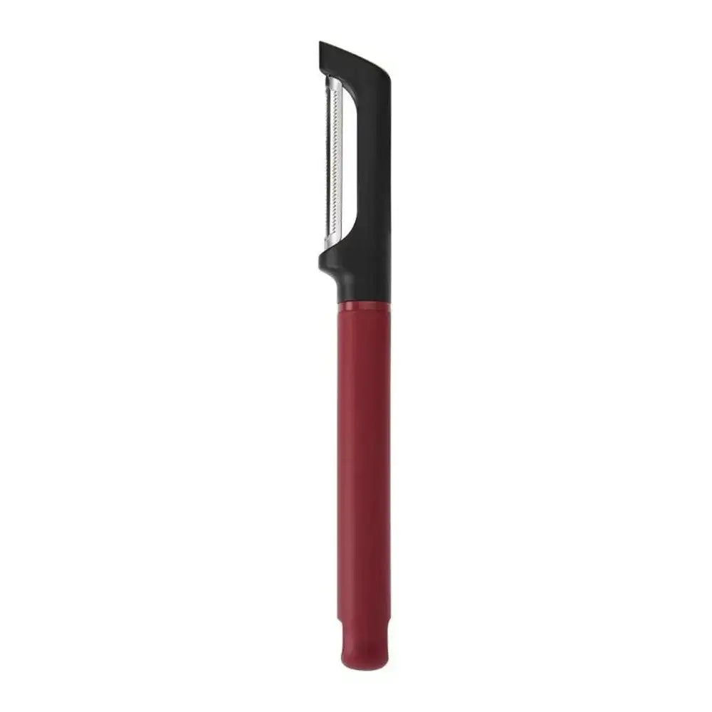 Peeler with red handle and black blade on a white background