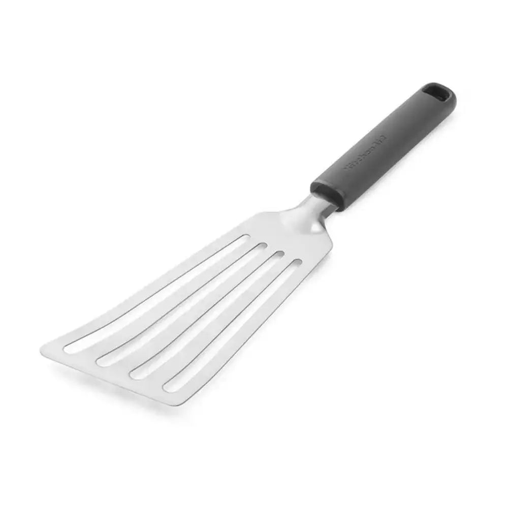 Metal spatula with a black handle on a white background