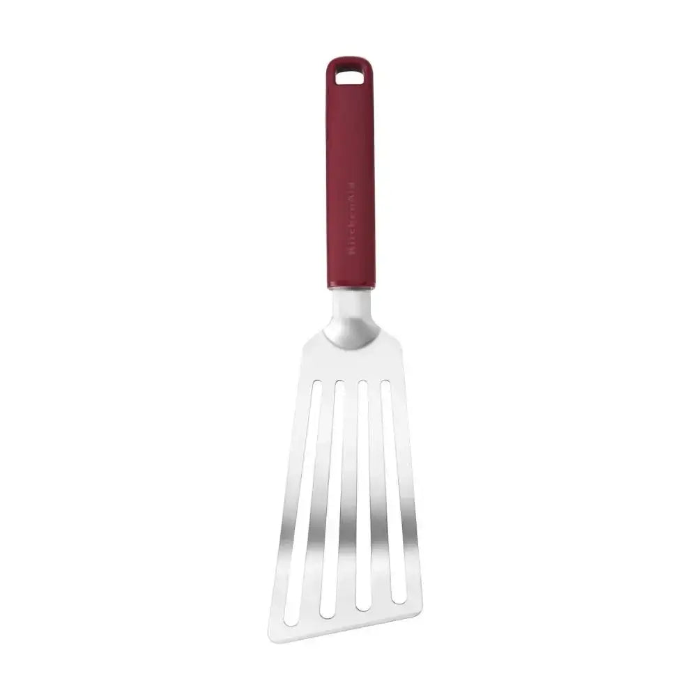 Metal spatula with a red handle on a white background