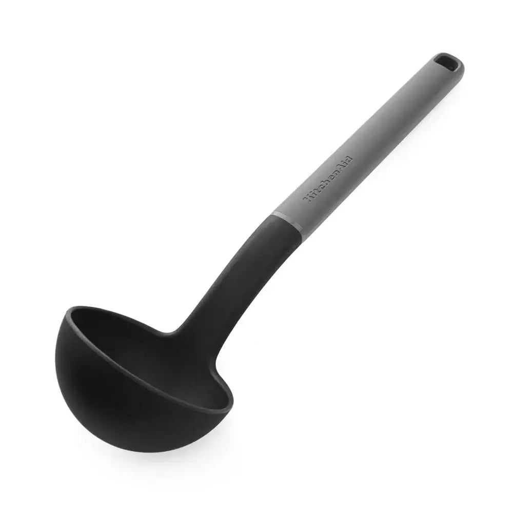 Black ladle with gray handle on a white background