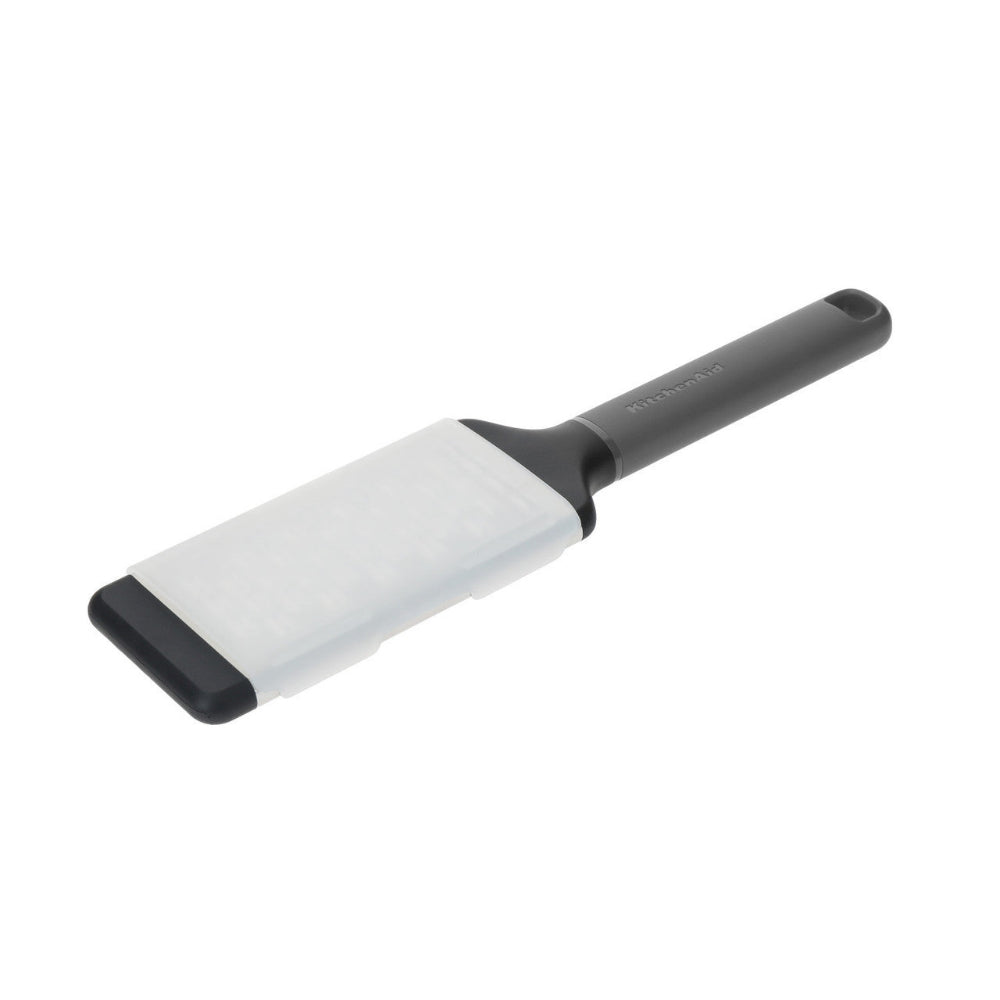 Grey Kitchenaid grater on a white background
