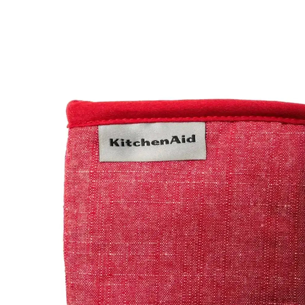 Red kitchen towel with a KitchenAid label on a white background