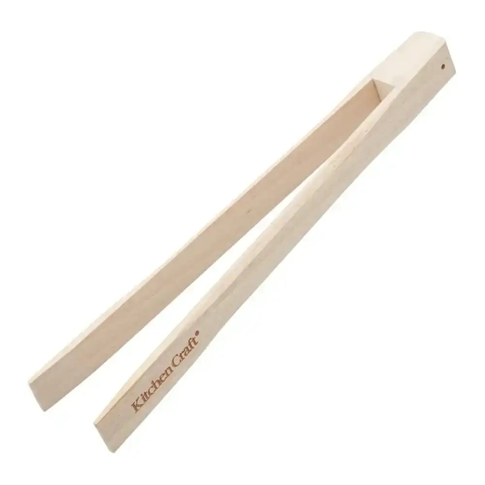 Wooden tongs with 'Kitchen Craft' branding on a white background