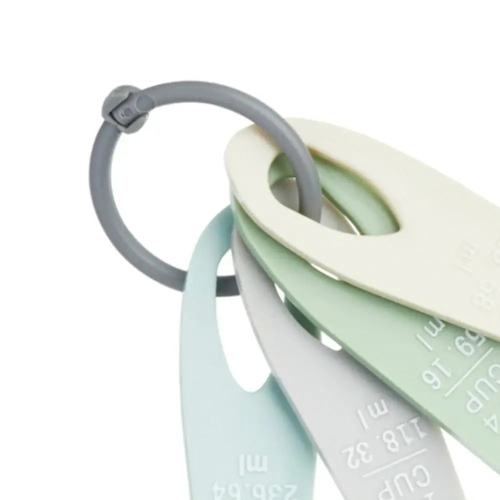 Set of measuring cups with a gray handle on a white background