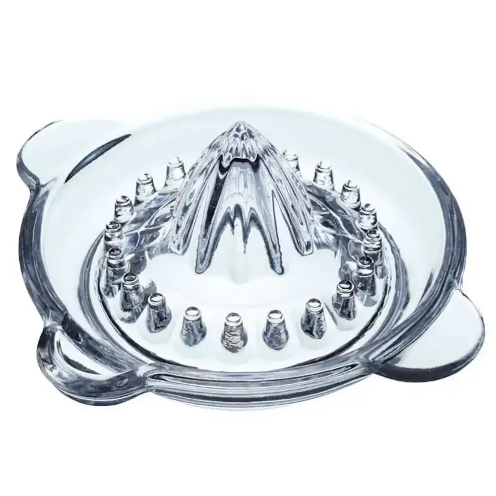 Clear glass manual juicer on a white background