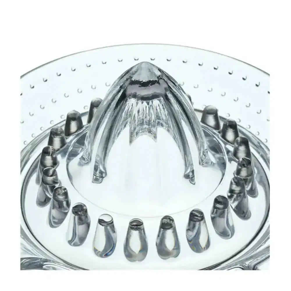 Clear glass citrus juicer on a white background