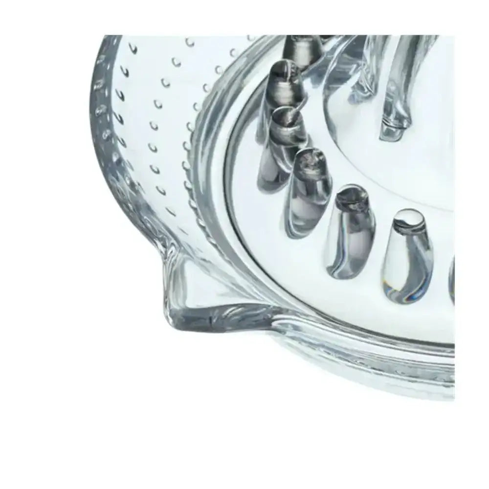Close-up of a clear glass object with metal components on a white background