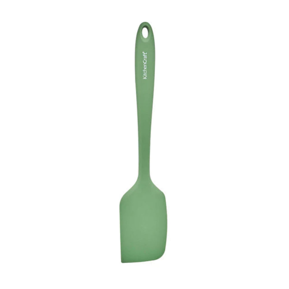 Green spatula with a handle on a white background