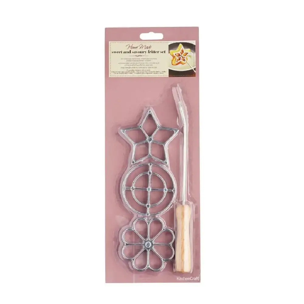 Decorative metal cutting dies with a wooden handle in packaging on a white background