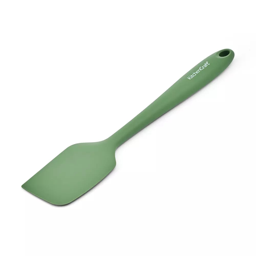 Green spatula with a visible brand name on a white background