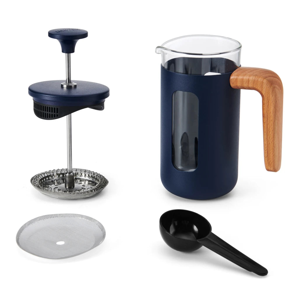 French press with spare parts and measuring spoon