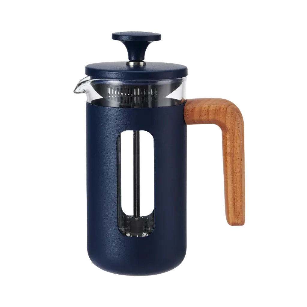 Dark blue french press with a white background 