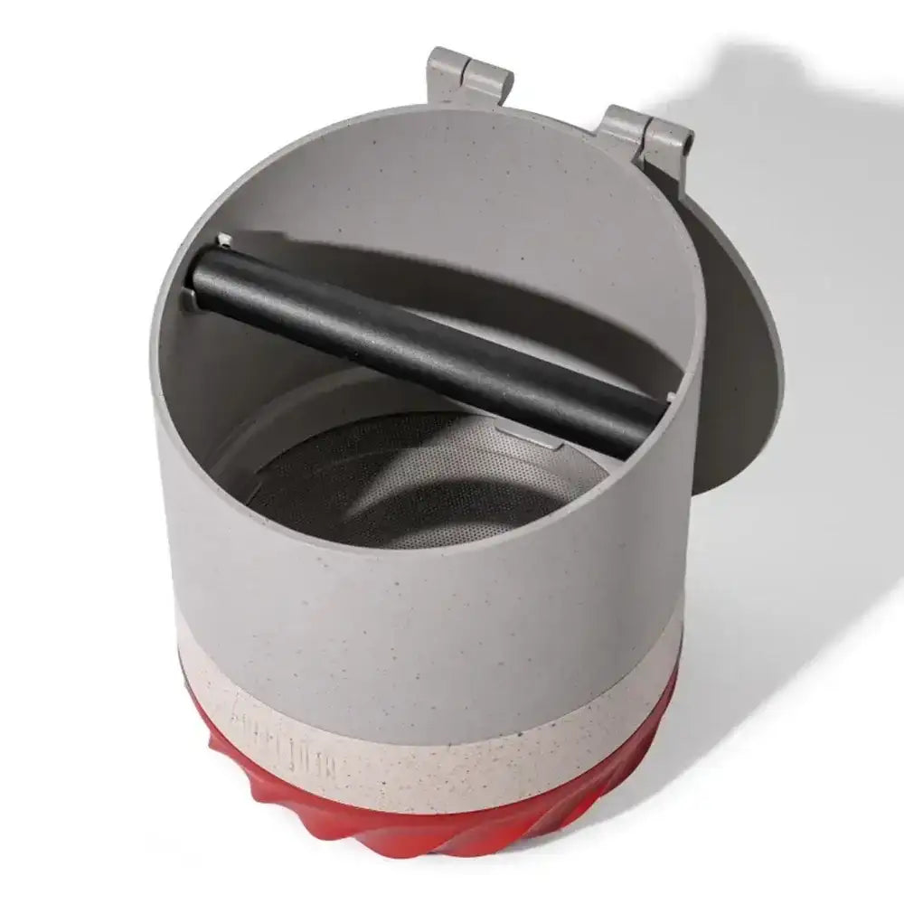 Gray and red kitchen tool with a lid on a white background