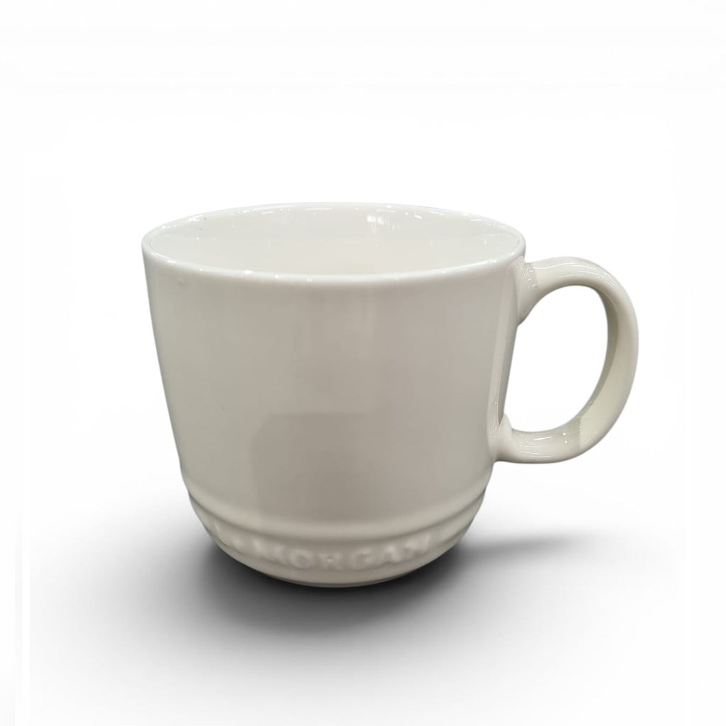 White ceramic mug on a white background