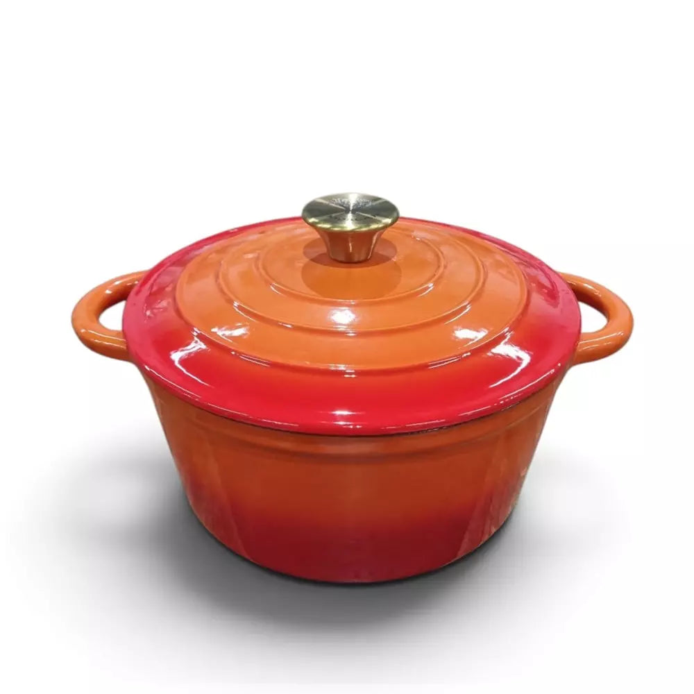 A round enameled cast iron Dutch oven pot with a lid, featuring a vibrant red and orange gradient finish with a metallic gold knob, set against a plain white background.