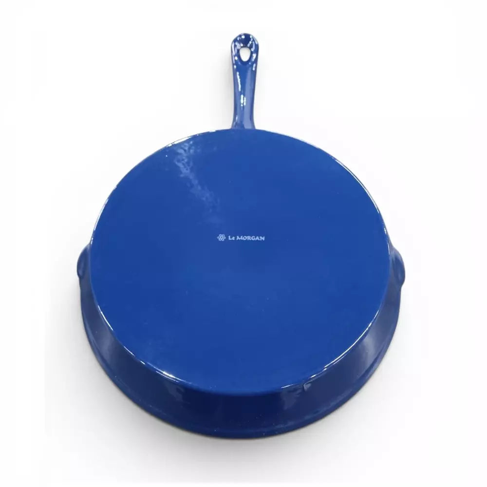 Blue cat iron enamel frying pan on a white background