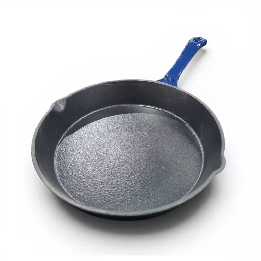 Blue cast iron frying pan with a blue handle on a white background
