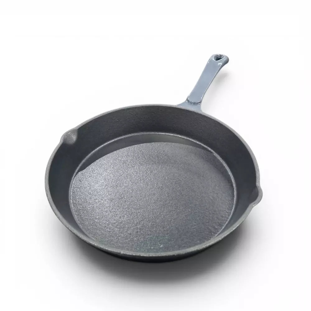 Grey frying pan with a grey handle on a white background