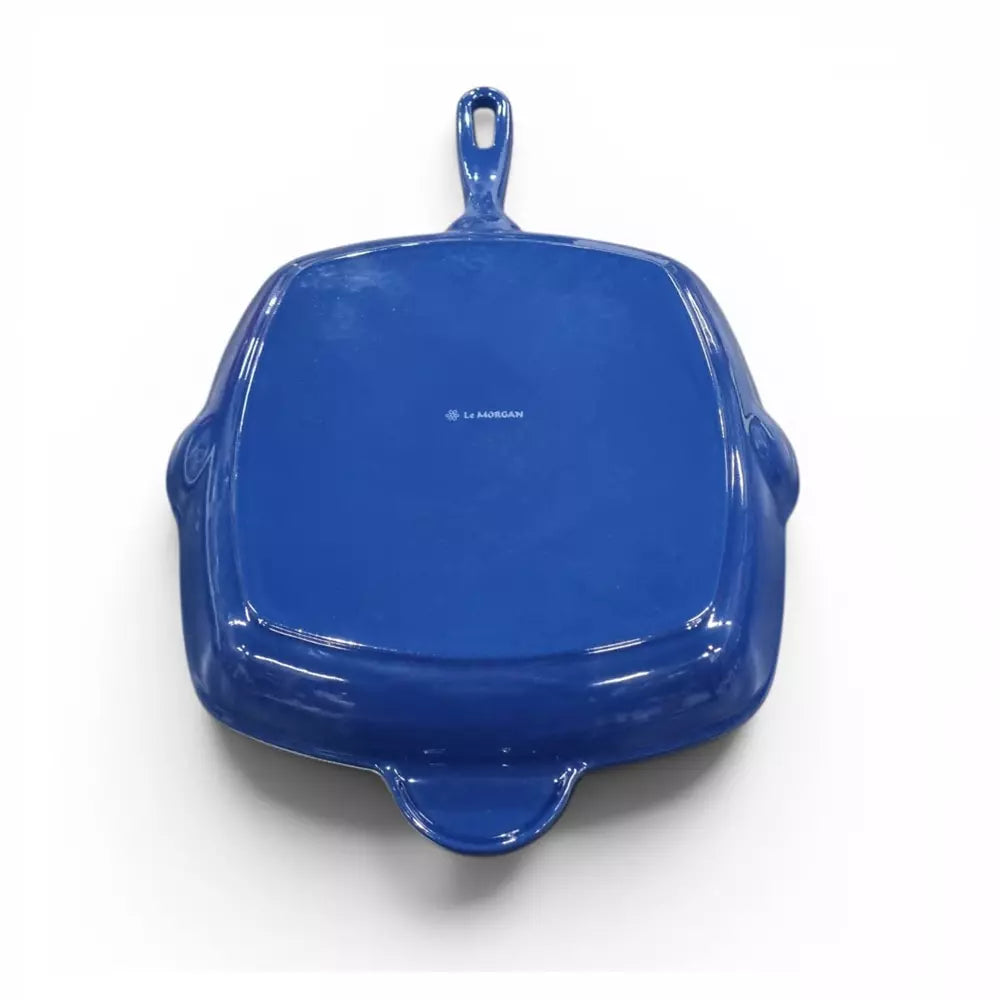 Blue cast iron grill pan on white background