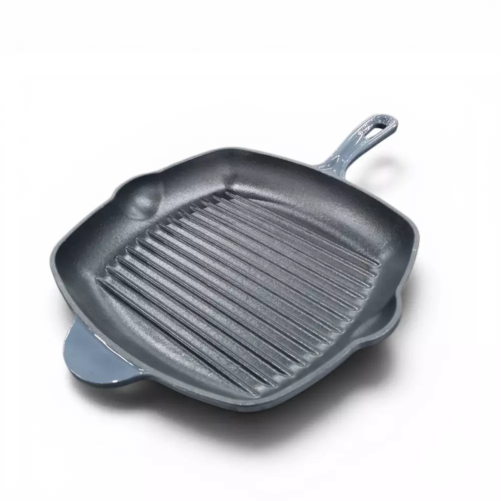 Gray cast iron grill pan on a white background