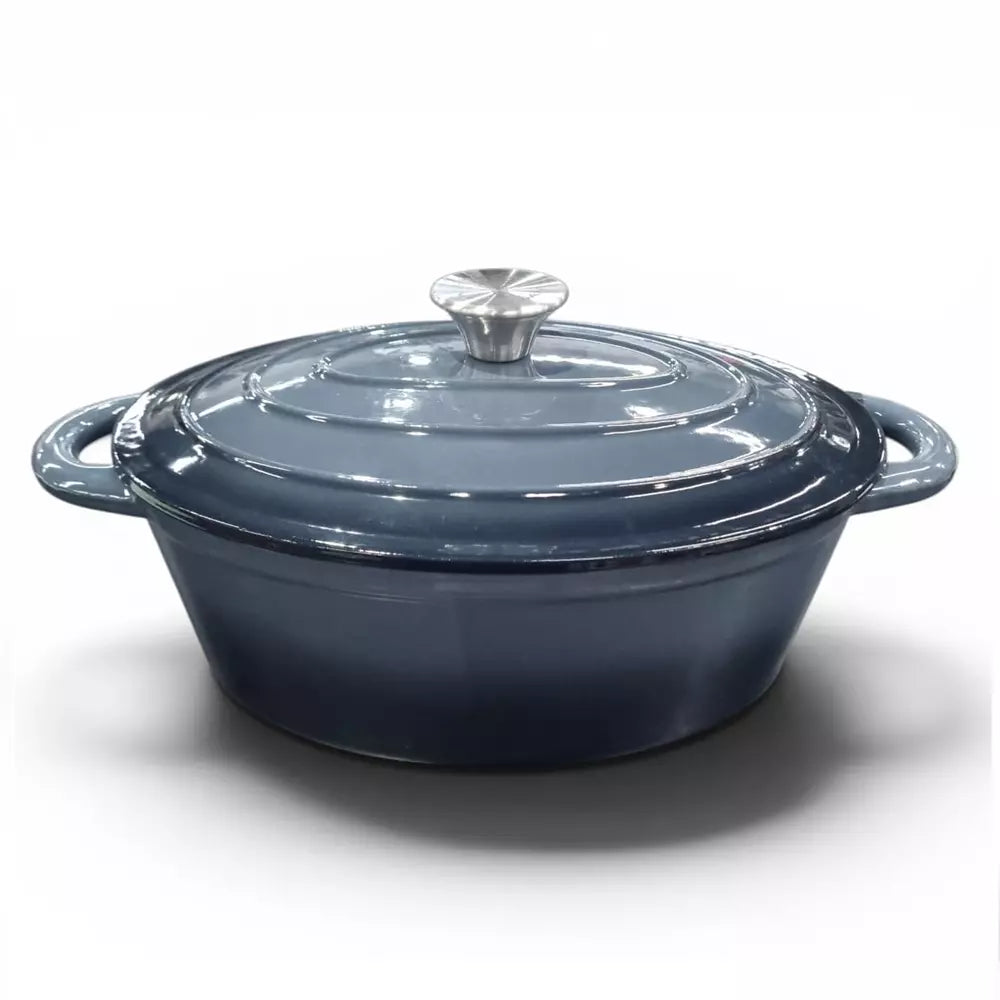 Grey enameled cast iron casserole dish with a lid on a white background